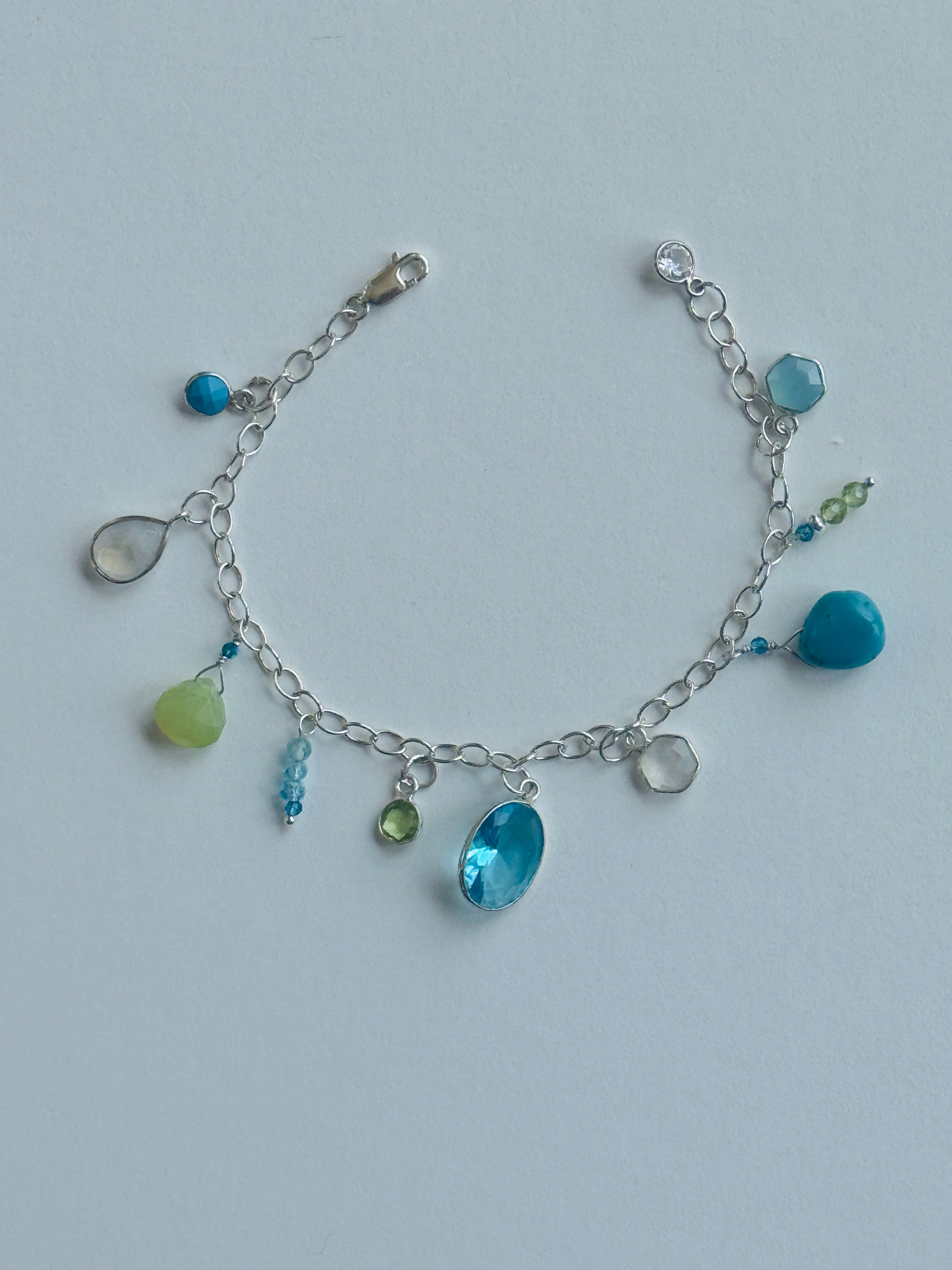 Sterling Silver Bracelet with Blue and Green Charms