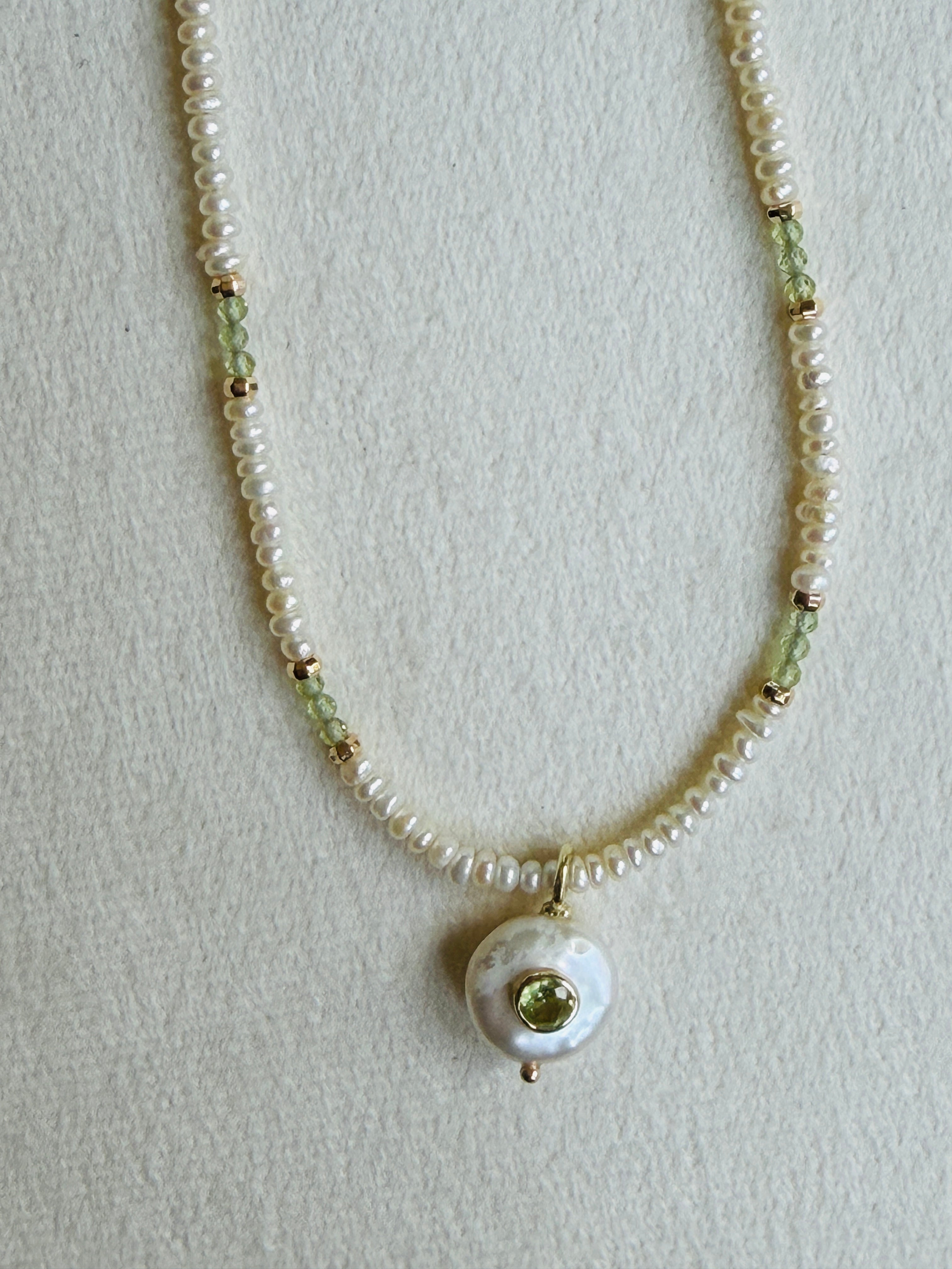 Pearl necklace with peridot and gold-filled accents and coin pearl and peridot pendant