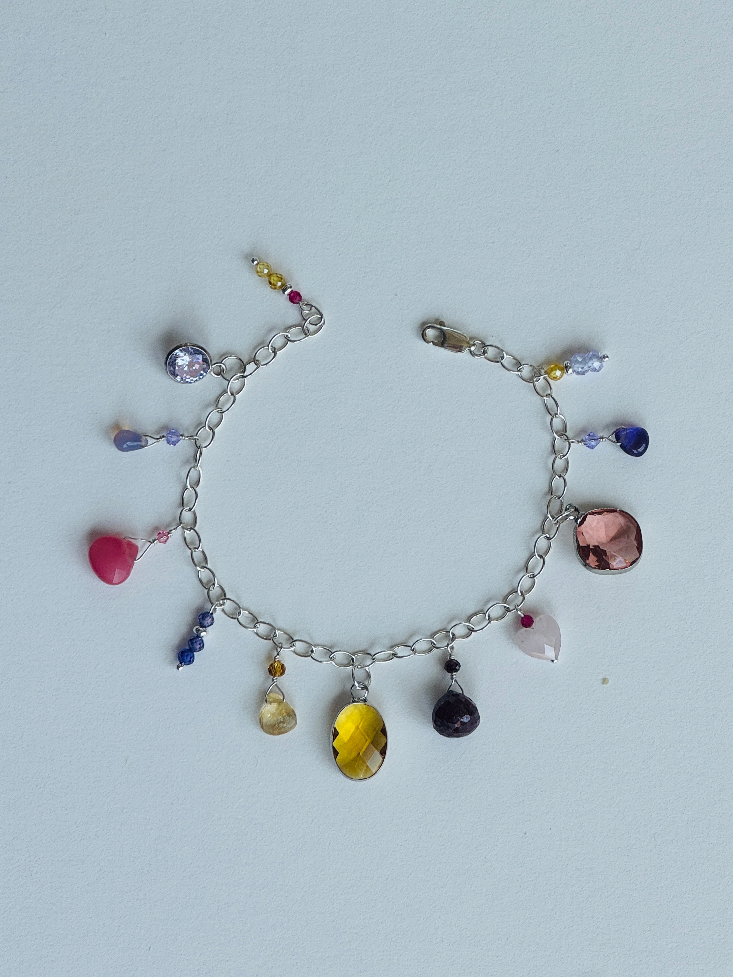 Sterling Silver Bracelet with Pink, Yellow, and Purple Charms